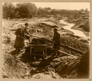 Miners washing gold-bearing sand