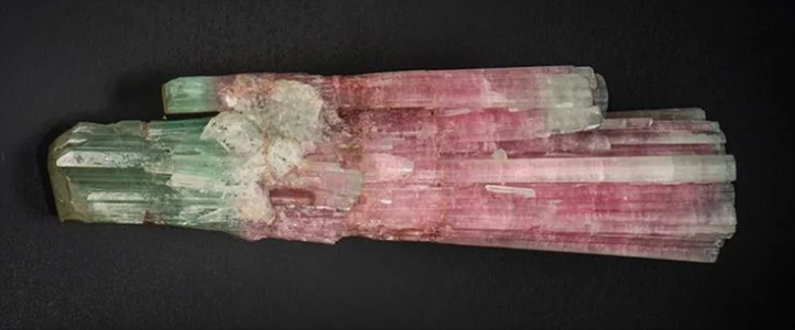 Stolen pink and green tourmaline crystal 